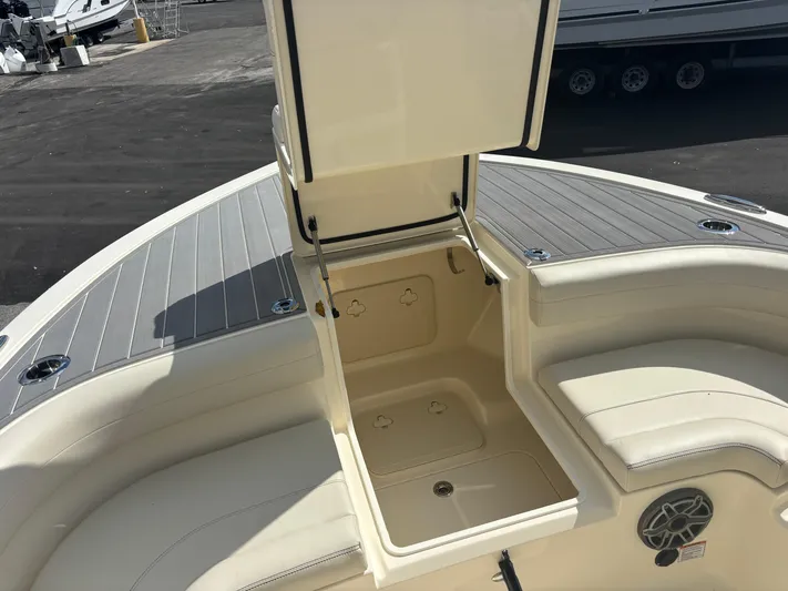  Yacht Photos Pics 2025 Scout 281 XSS boat interior with open storage compartment.