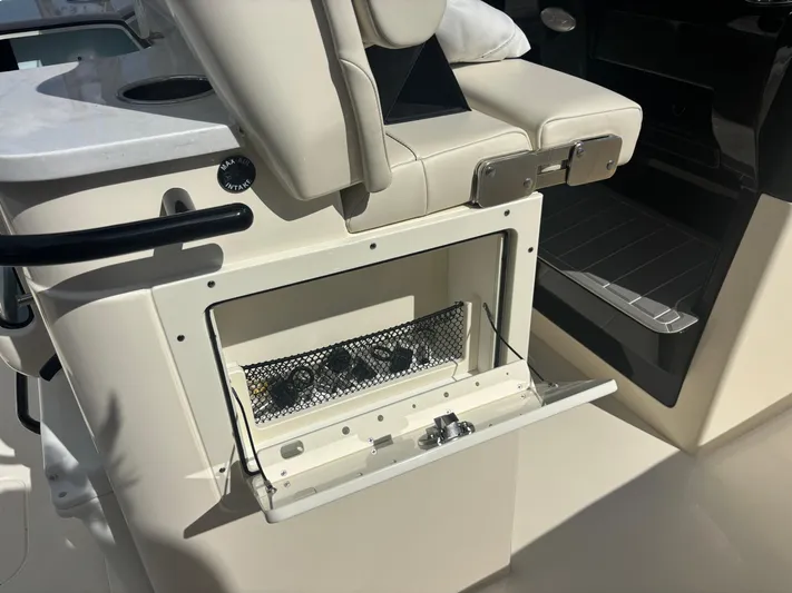  Yacht Photos Pics 2025 Scout 281 XSS boat interior storage compartment with seating.