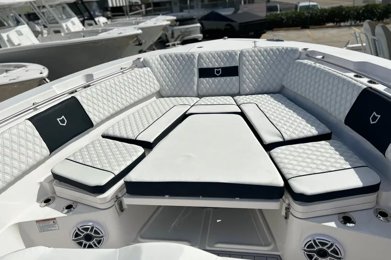  Yacht Photos Pics Luxurious seating area on 2026 Sea Fox 368 Commander boat with quilted upholstery.