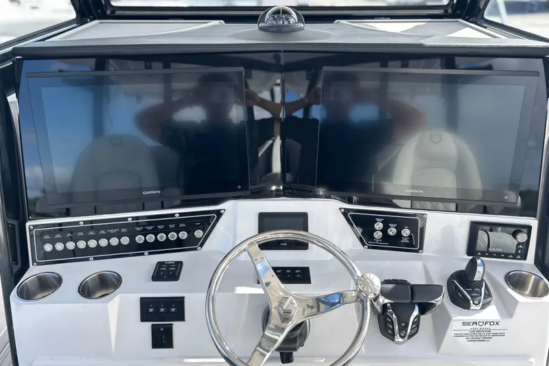  Yacht Photos Pics 2026 Sea Fox 368 Commander dashboard with dual Garmin displays and modern controls.