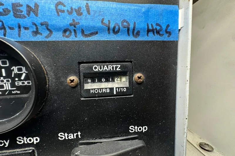 So Blessed Yacht Photos Pics Hour meter on 1998 Viking 54 Motor Yacht dashboard, showing 4106.4 hours.