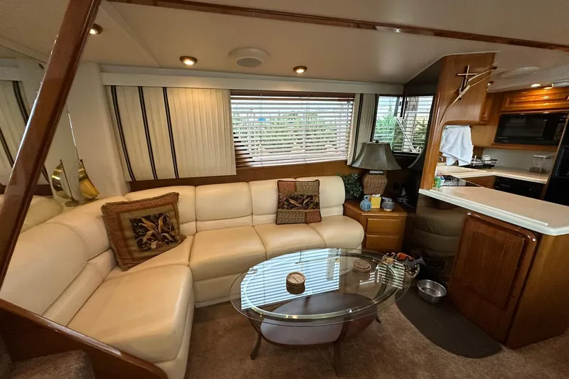 So Blessed Yacht Photos Pics Luxurious interior of a 1998 Viking 54 Motor Yacht with elegant seating and modern amenities.
