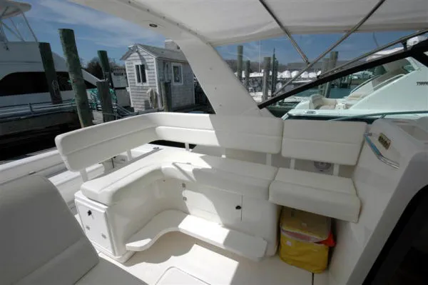 Vixen Yacht Photos Pics Interior of a 2002 Tiara Yachts 3500 Open, white upholstery.