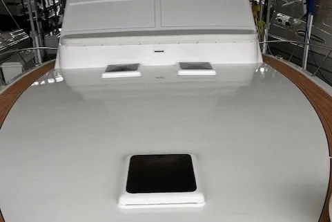  Yacht Photos Pics 1984 Post 43 Sport Fisherman boat deck with hatch and wooden trim.