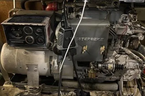  Yacht Photos Pics 1984 Post 43 Sport Fisherman engine room with Westerbeke generator and control panel.