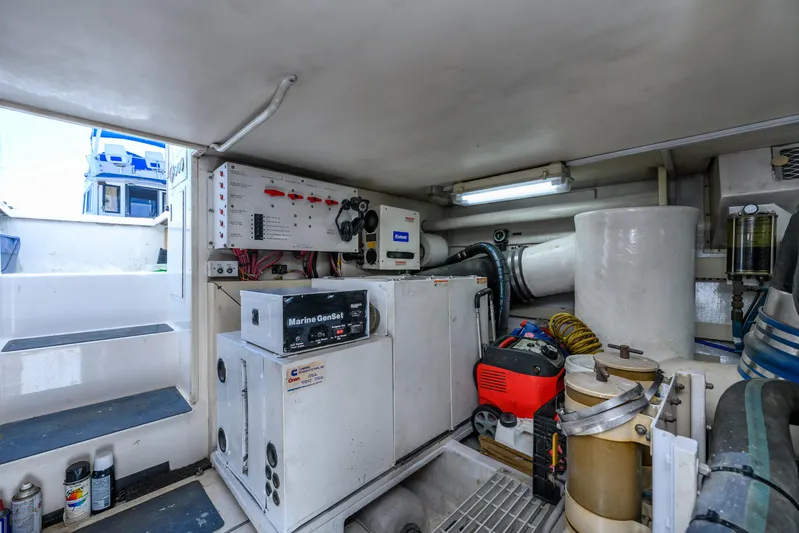 Marysea Yacht Photos Pics Engine room of 1999 Viking 58 Convertible yacht with Marine GenSet and control panels.