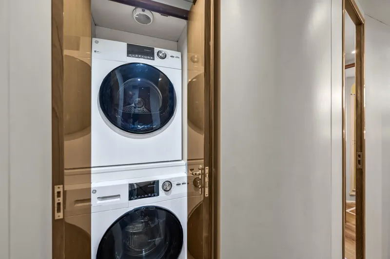 Marysea Yacht Photos Pics Stacked washer and dryer in 1999 Viking 58 Convertible yacht interior.