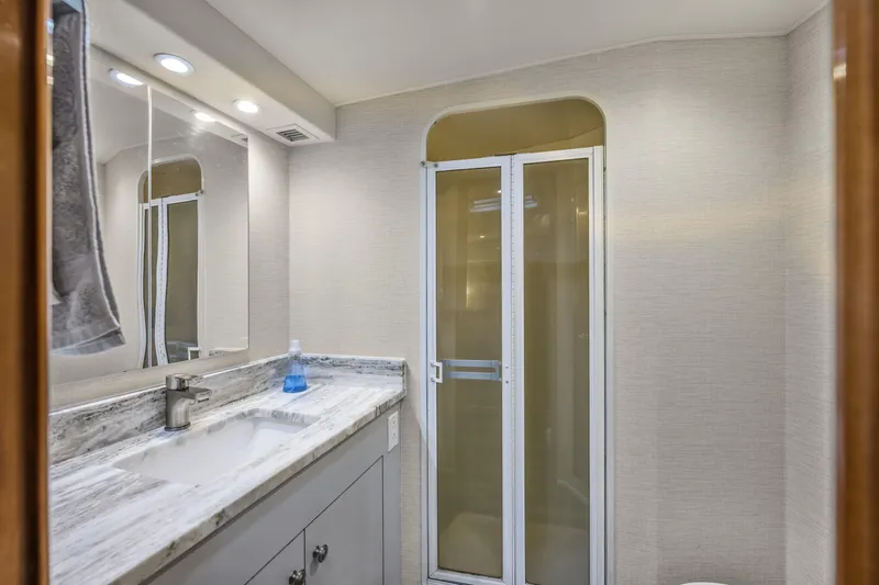 Marysea Yacht Photos Pics Bathroom interior of 1999 Viking 58 Convertible yacht with modern fixtures and shower.