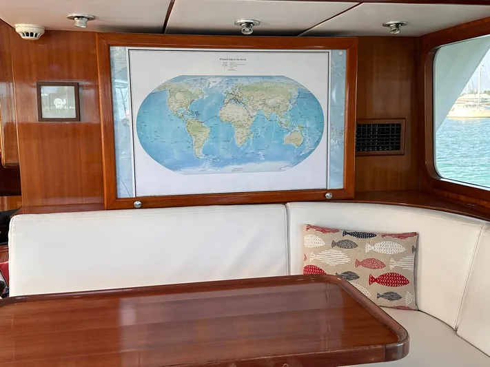 Beyond Capricorn 1 Yacht Photos Pics Cozy Nordhavn 57 yacht interior with world map and nautical-themed decor, 2001 model.