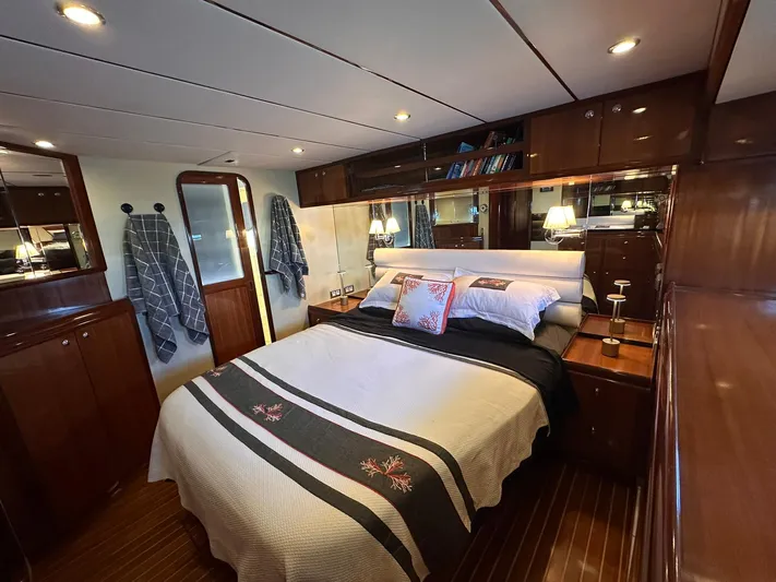 Beyond Capricorn 1 Yacht Photos Pics Luxurious cabin interior of a 2001 Nordhavn 57 yacht with elegant wood finishes.