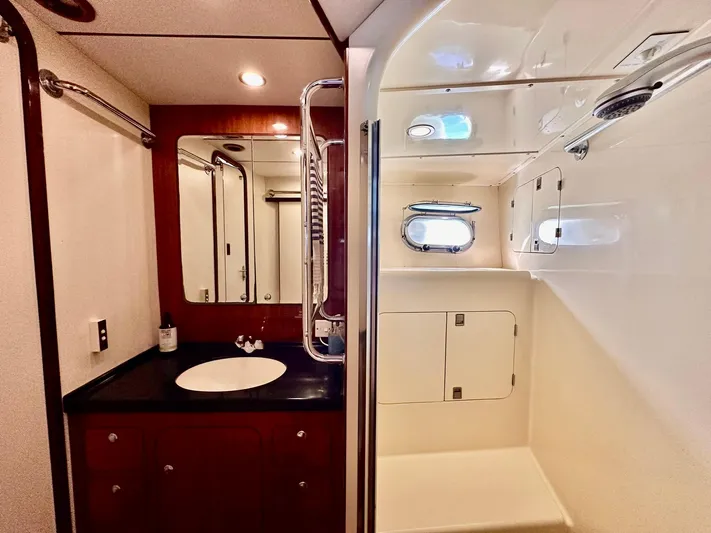 Beyond Capricorn 1 Yacht Photos Pics Luxurious bathroom in a 2001 Nordhavn 57 yacht, featuring modern fixtures and elegant design.