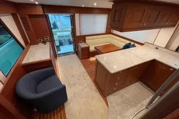 Oasis Yacht Photos Pics Luxurious interior of 2024 Northwest 55 yacht with modern furnishings and elegant design.