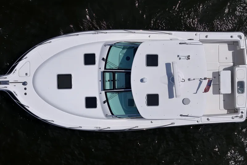 T-time Yacht Photos Pics Aerial view of 2006 Tiara 3200 Open yacht on water.