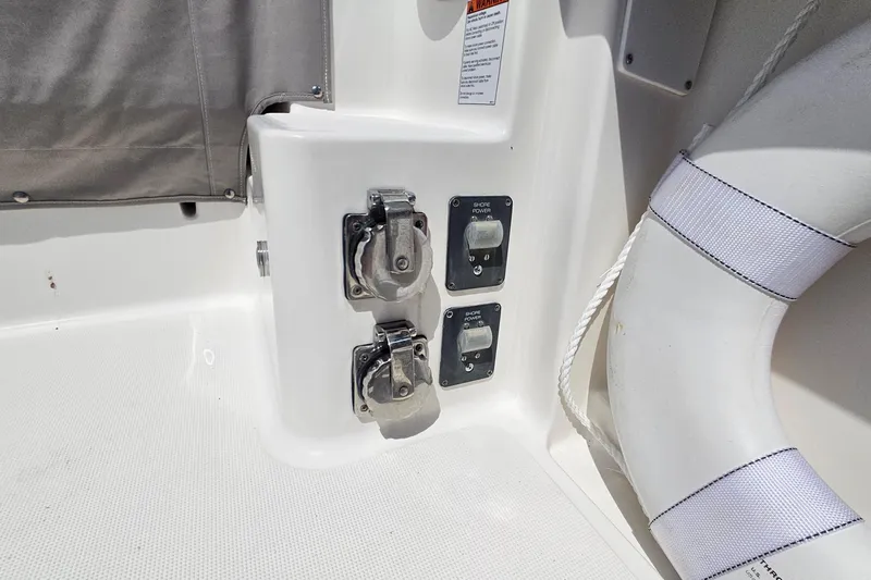 T-time Yacht Photos Pics 2006 Tiara 3200 Open boat shore power connections and life preserver detail.