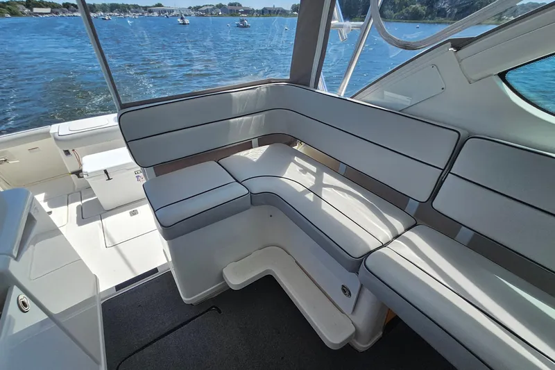 T-time Yacht Photos Pics 2006 Tiara 3200 Open boat interior with cushioned seating and scenic water view.