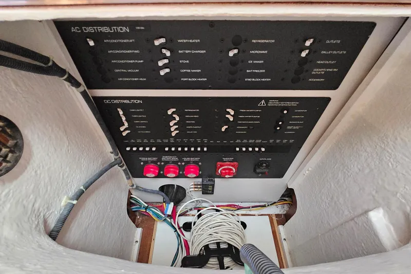T-time Yacht Photos Pics Electrical panel of a 2006 Tiara 3200 Open boat, showing AC and DC distribution.