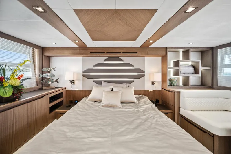  Yacht Photos Pics Luxurious bedroom interior of 2019 Galeon 560 Sky yacht with modern design elements.