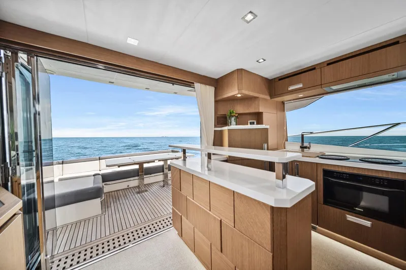 Yacht Photos Pics Luxurious interior of 2019 Galeon 560 Sky yacht with ocean view.