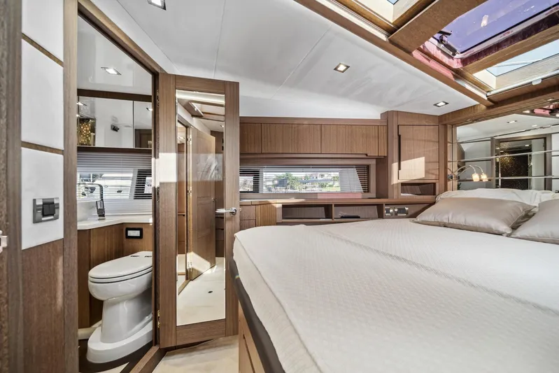  Yacht Photos Pics Luxurious interior of 2019 Galeon 560 Sky yacht with modern bedroom and bathroom.