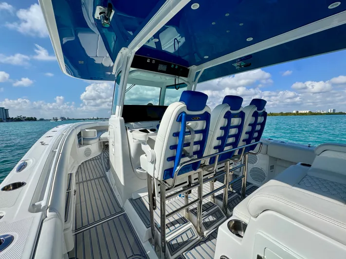  Yacht Photos Pics 2019 HCB 42 Siesta boat interior with blue seating, open water view.
