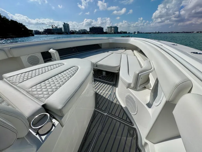  Yacht Photos Pics Luxurious 2019 HCB 42 Siesta boat interior with white seating and ocean view.