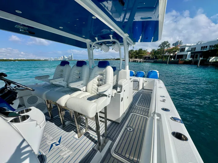  Yacht Photos Pics 2019 HCB 42 Siesta boat with luxurious seating on a sunny day by the water.