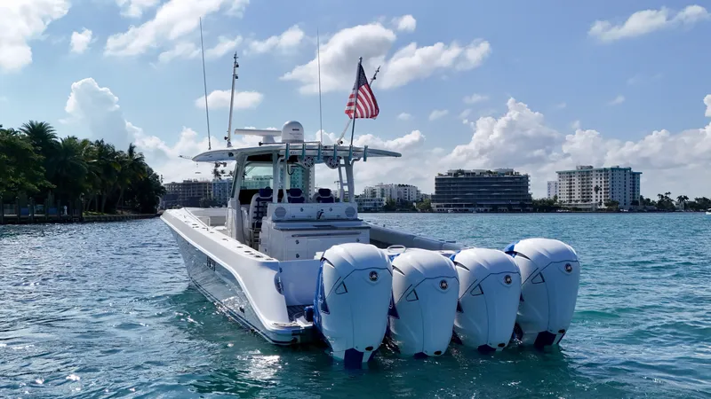  Yacht Photos Pics 2019 HCB 42 Siesta boat with four engines on a sunny day in coastal waters.