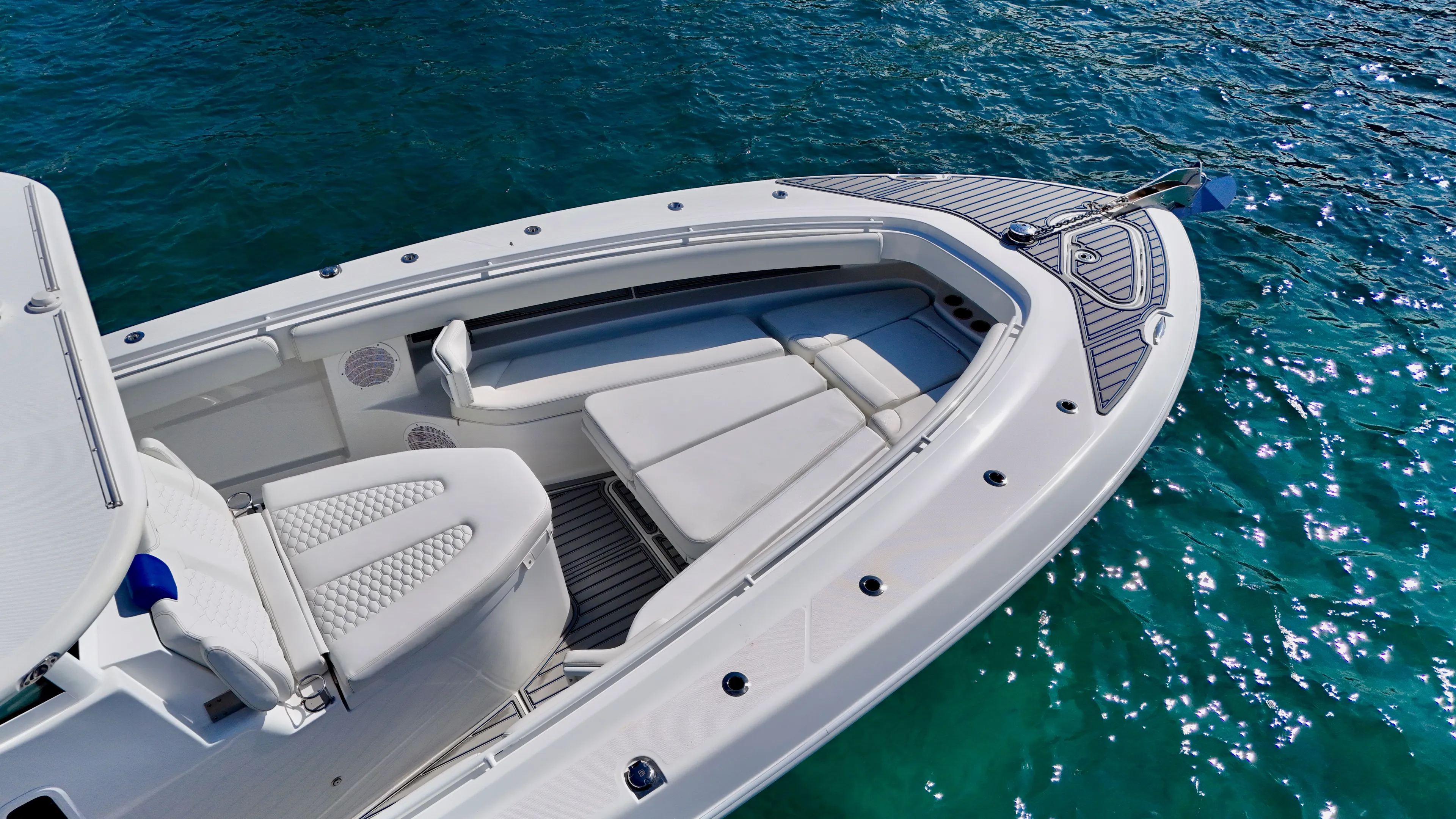  Yacht Photos Pics 2019 HCB 42 Siesta boat with luxurious seating on sparkling blue water.