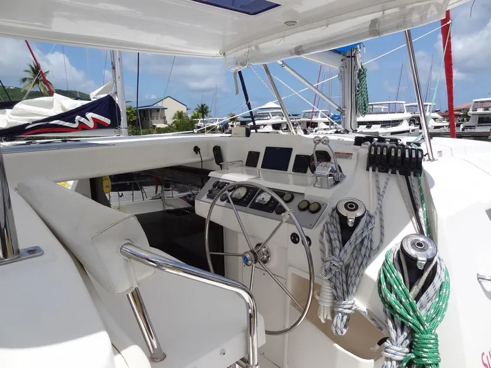 Blue Tiger Yacht Photos Pics Helm of 2021 Leopard 40 catamaran with modern navigation equipment and rope storage.