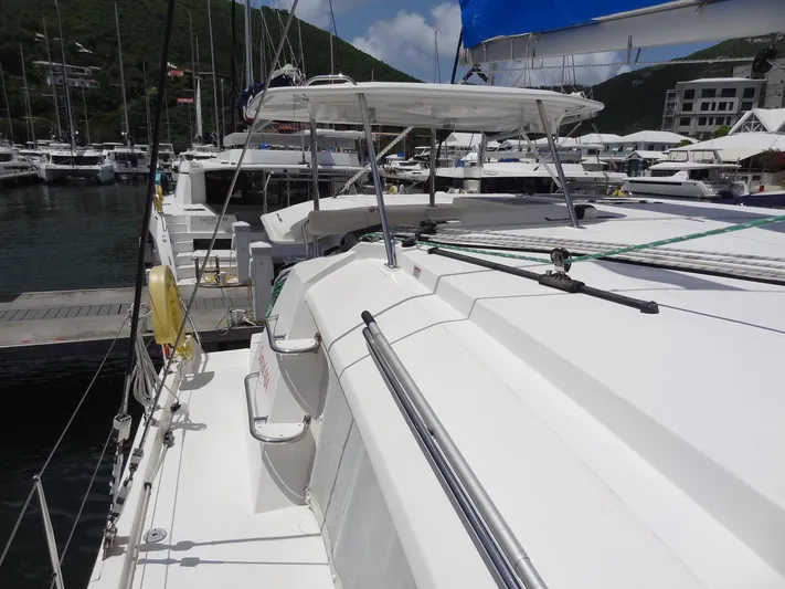 Blue Tiger Yacht Photos Pics 2021 Leopard 40 catamaran docked at marina with scenic mountain backdrop.