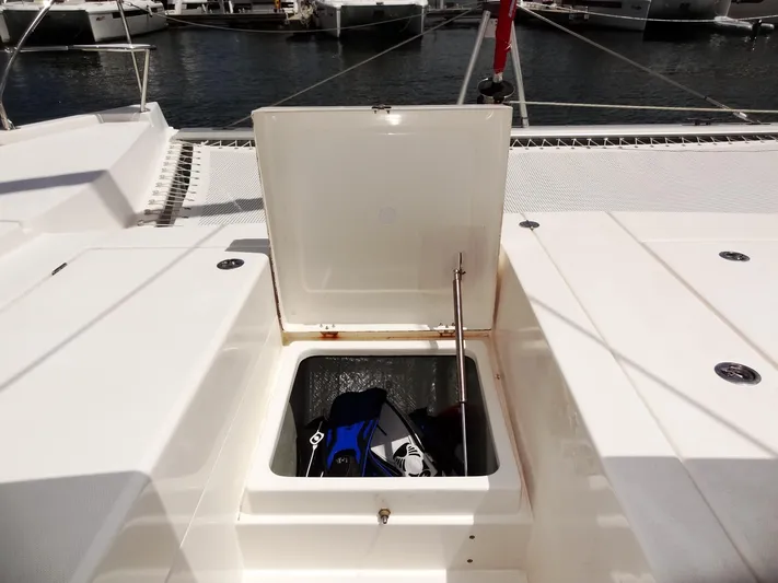 Blue Tiger Yacht Photos Pics Open storage compartment on 2021 Leopard 40 catamaran deck, containing snorkeling gear.