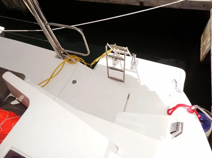 Blue Tiger Yacht Photos Pics Leopard 40 catamaran deck with ladder and ropes, docked at marina, 2021 model.