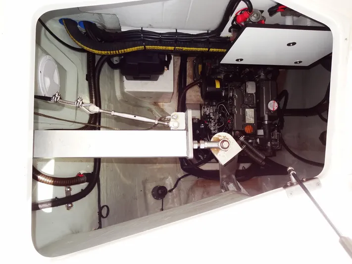 Blue Tiger Yacht Photos Pics Engine compartment of a 2021 Leopard 40 catamaran, showcasing mechanical components and wiring.