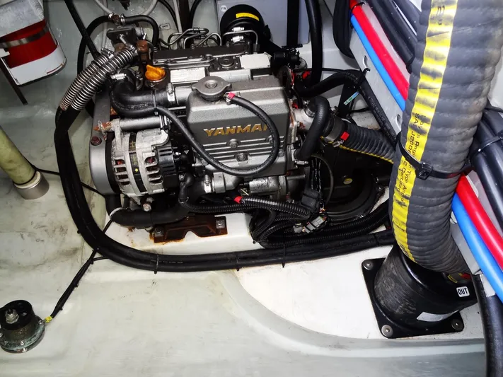 Blue Tiger Yacht Photos Pics Engine compartment of a 2021 Leopard 40, featuring a Yanmar engine.