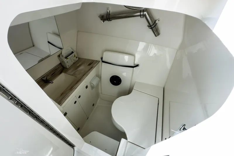 Pathfinder Yacht Photos Pics 2021 Pursuit DC 326 Dual Console boat interior with modern bathroom amenities.