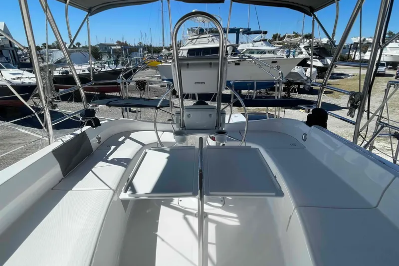 La Veda Yacht Photos Pics 2003 Hunter 426 Deck Salon yacht cockpit with steering wheel and seating area.