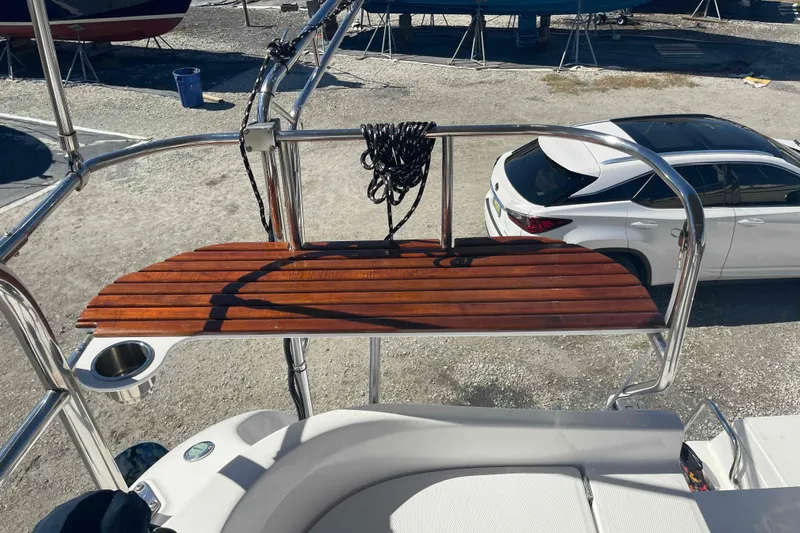 La Veda Yacht Photos Pics Hunter 426 Deck Salon 2003 yacht with wooden deck and stainless steel railing.