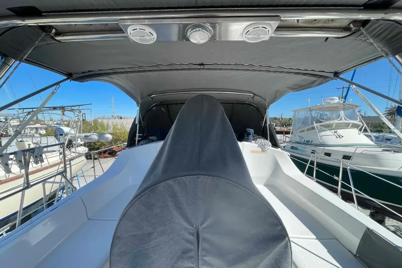 La Veda Yacht Photos Pics 2003 Hunter 426 Deck Salon sailboat with covered cockpit and marina view.