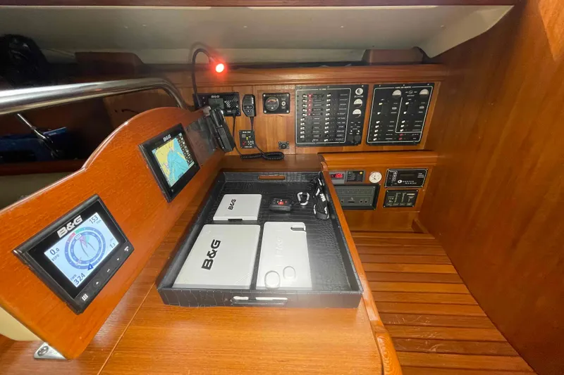 La Veda Yacht Photos Pics Control panel of 2003 Hunter 426 Deck Salon with navigation instruments and displays.