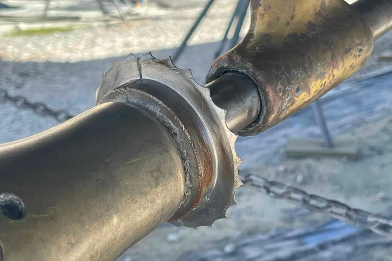 La Veda Yacht Photos Pics Close-up of a worn metal component on a 2003 Hunter 426 Deck Salon yacht.