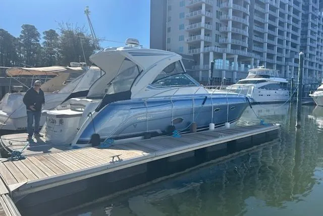 Sea Star Yacht Photos Pics 2018 Formula 40 Performance Cruiser docked at marina with modern buildings in background.