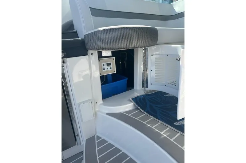 Sea Star Yacht Photos Pics 2018 Formula 40 Performance Cruiser interior with open storage compartment and control panel.