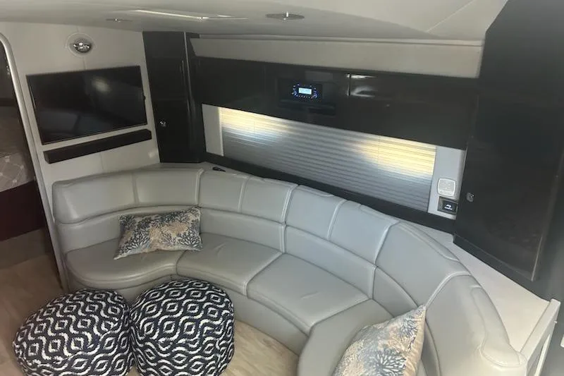 Sea Star Yacht Photos Pics 2018 Formula 40 Performance Cruiser interior with curved seating and modern decor.