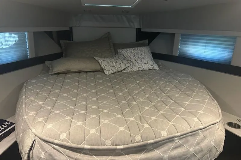 Sea Star Yacht Photos Pics 2018 Formula 40 Performance Cruiser cabin with cozy bed and pillows.