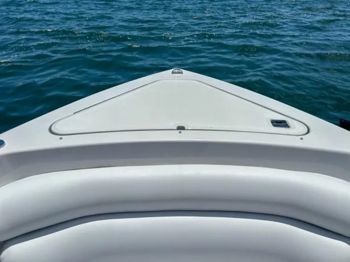  Yacht Photos Pics Bow view of 2020 Aviara AV32 OB boat on water.