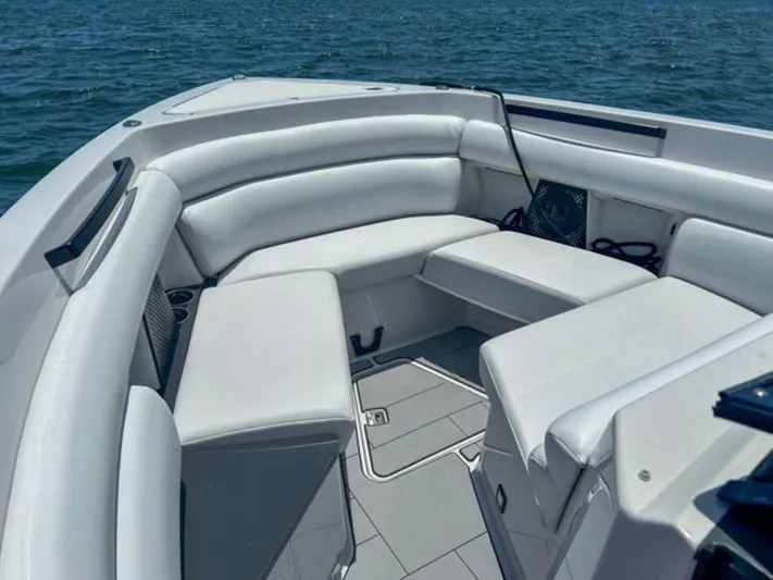  Yacht Photos Pics 2020 Aviara AV32 OB boat interior with white cushioned seating.
