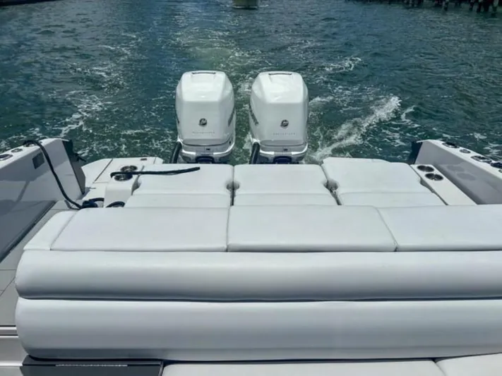  Yacht Photos Pics 2020 Aviara AV32 OB boat with twin outboard engines on water.
