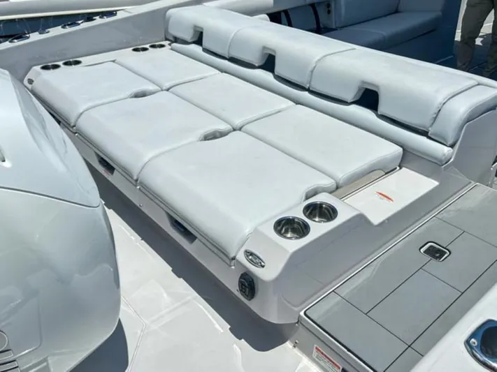  Yacht Photos Pics 2020 Aviara AV32 OB boat with spacious white cushioned seating and cup holders.