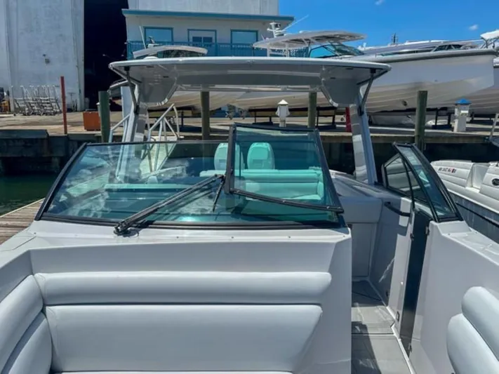  Yacht Photos Pics 2020 Aviara AV32 OB boat docked at marina, front view.