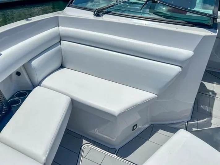  Yacht Photos Pics 2020 Aviara AV32 OB boat with white cushioned seating and modern design.